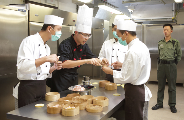 Graduates of the Dim Sum Making Training Course in Tong Fuk Correctional Institution are accredited by public training bodies.