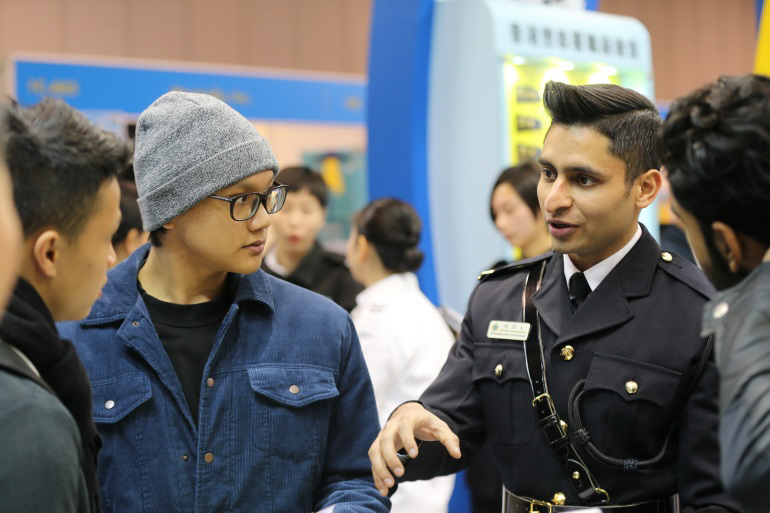 Photo 1 - Officers coming from different sections/units shared their work experience with visitors at Education & Careers Expo 2018.