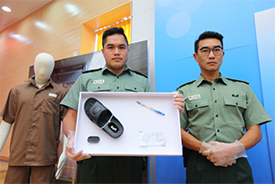Staff displayed the gambling paraphernalia and contraband seized in the operations at the press briefing on anti-gambling operations ahead of World Cup 2018.