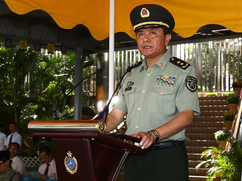 The Commander of the People's Liberation Army Hong Kong Garrison, Lieutenant General Wang Xiaojun, addresses a Correctional Services Department (CSD) passing-out parade at the Staff Training Institute of the CSD in Stanley today (June 27).