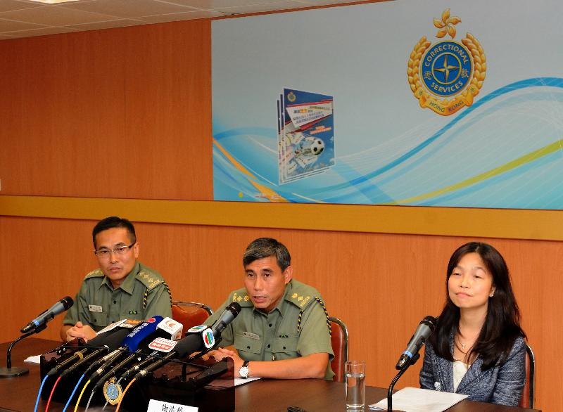 Senior Superintendent (Quality Assurance) of the Correctional Services Department (CSD) Mr Tse Ho-yin (centre), Chief Officer (Inspectorate and Security) Mr Wat Pak-hang (left) and clinical psychologist Ms Lee Kit-shan (right) speak on the effectiveness of the CSD's anti-gambling and enhanced publicity measures during World Cup 2014 today (August 5).