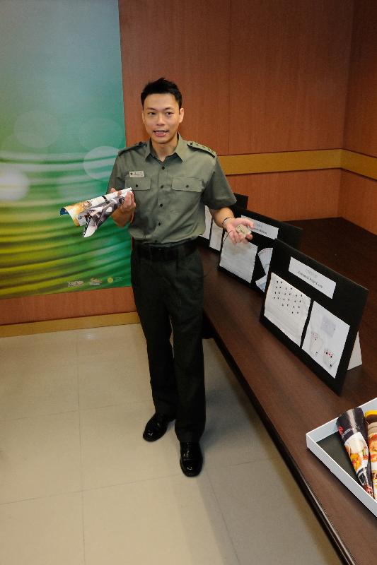 Principal Officer (Security) Mr Liu Wing-lok shows homemade gambling equipment seized during the operations.