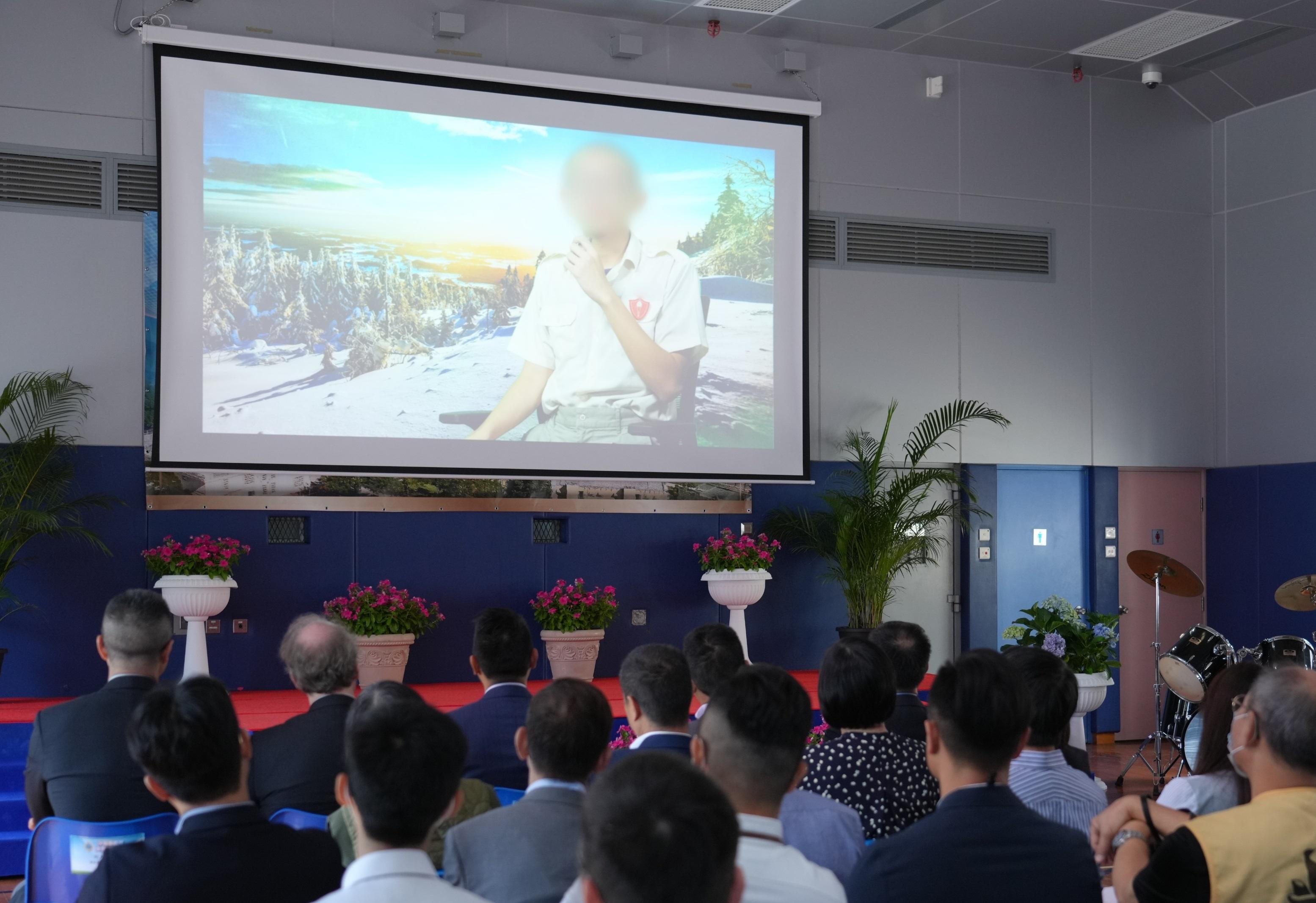 Young persons in custody (PICs) at Sha Tsui Correctional Institution of the Correctional Services Department were presented with certificates at a ceremony today (October 13) in recognition of their efforts and achievements in studies and vocational examinations. Photo shows guests attending the ceremony watching a short video produced by PICs.