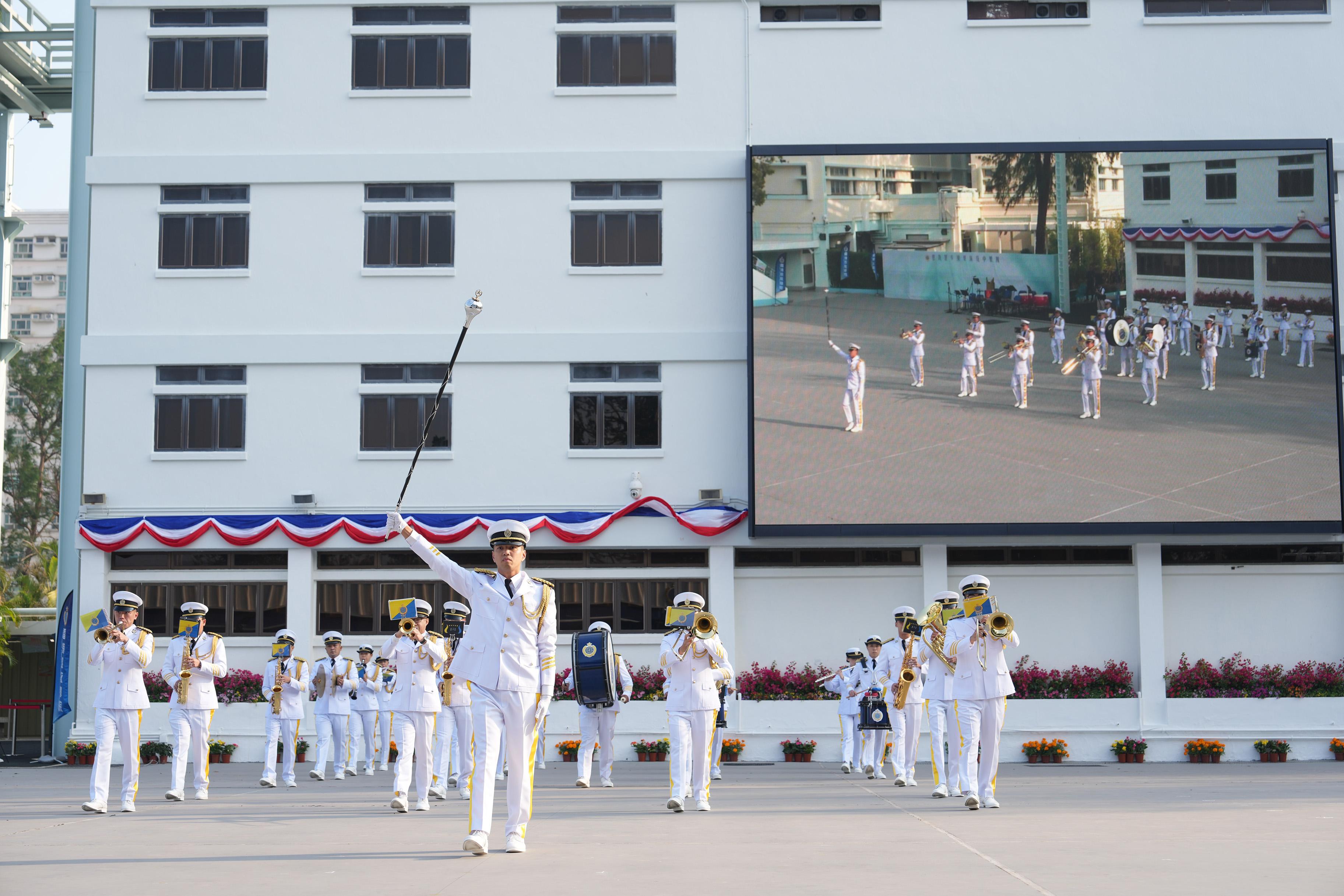 The Correctional Services Department held a passing-out parade at the Hong Kong Correctional Services Academy today (November 24). Photo shows a music performance by the Marching Band.