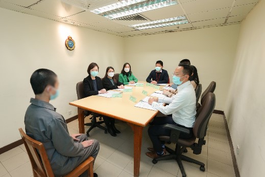 Young Offender Assessment Panel interviewing an inmate