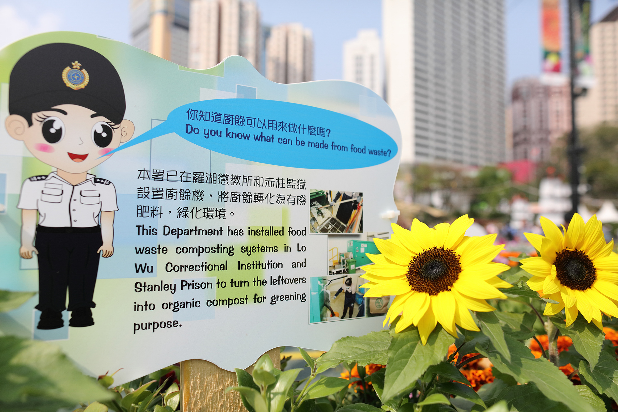 Disposed wooden pallet and tires are used in the booth at the annual Hong Kong Flower Show.