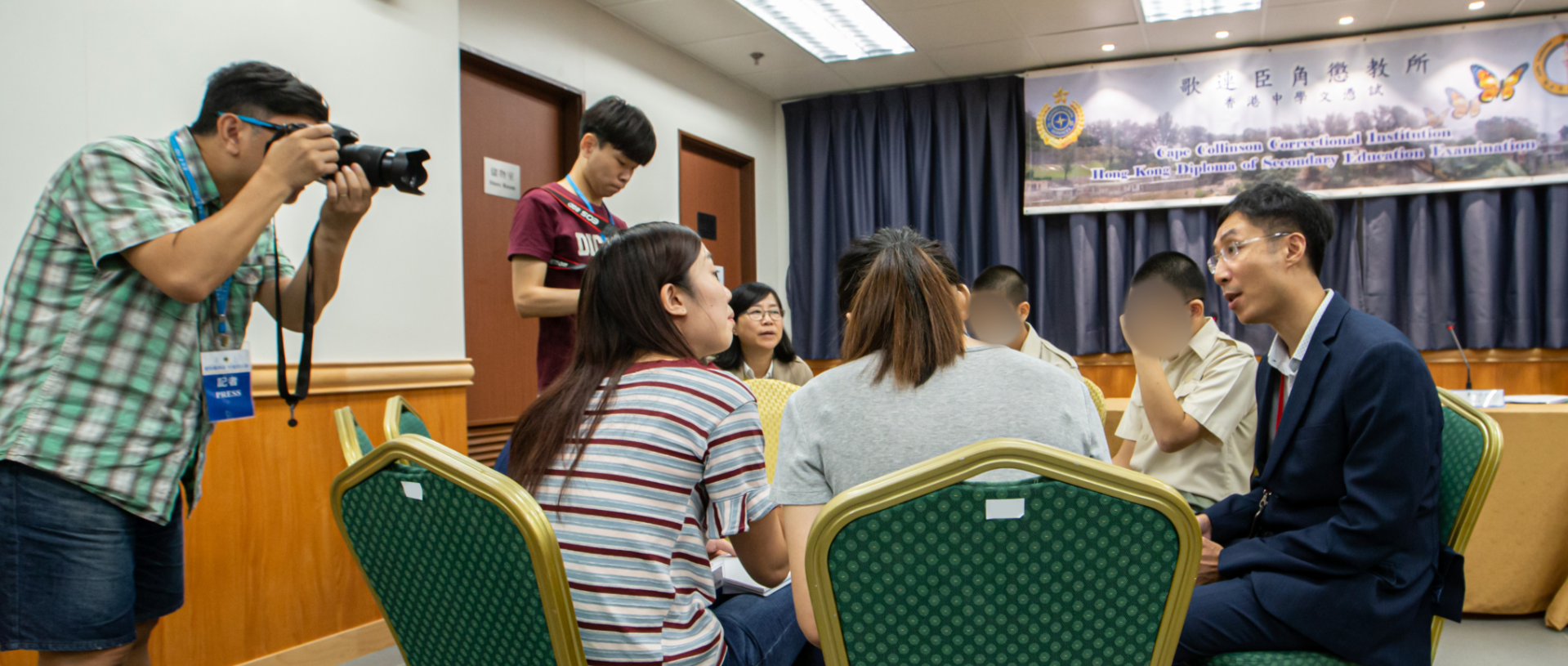 The media interview young persons in custody who have attended Hong Kong Diploma of Secondary Education Examination and their teacher.