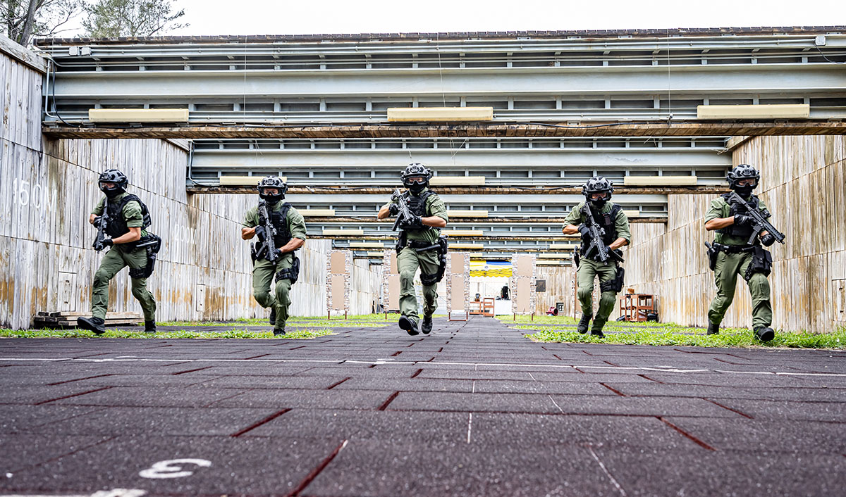 RRT members undergo weapon and arms training.