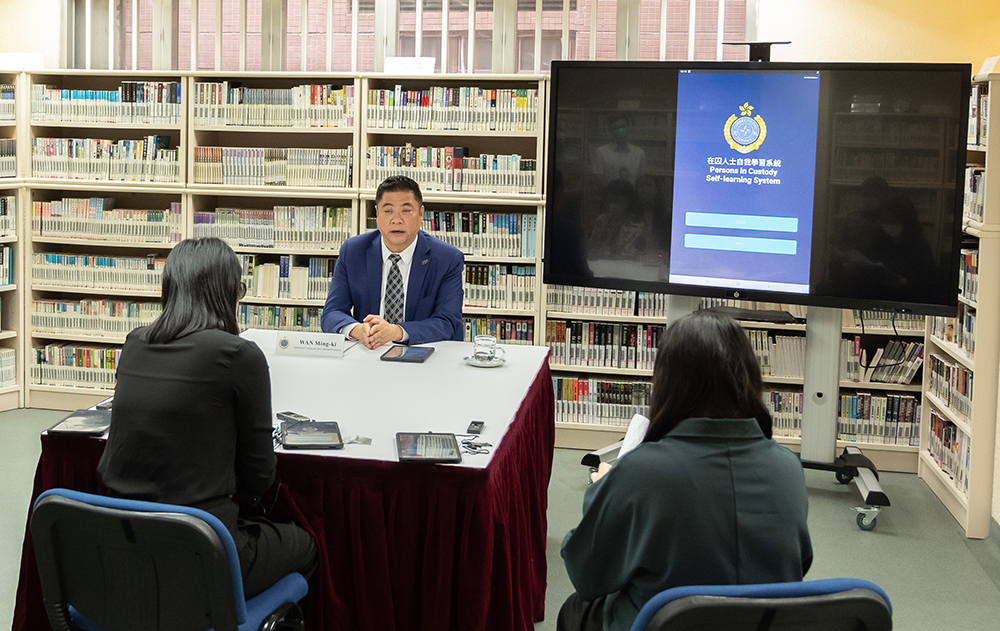 CSD’s Assistant Commissioner (Rehabilitation), Mr Wan Ming-ki, briefs the media on the implementation details of the trial run of the “Persons in Custody’s Self-learning System” for Category A persons in custody and its future development.