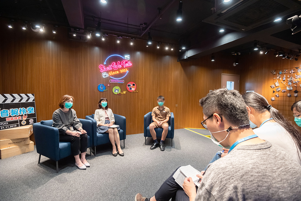 CSD’s Principal II Ms Siu Pui-fan (first left), Senior Clinical Psychologist Ms Kwong Yee-wah (second left), and a young person in custody who will sit for the HKDSE exams, attend a media interview on education and psychological support services provided to young persons in custody.