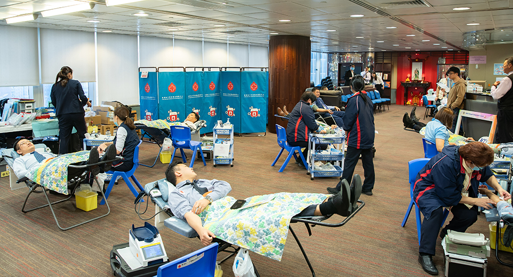 Correctional officers in various positions actively participate in blood donation activities.