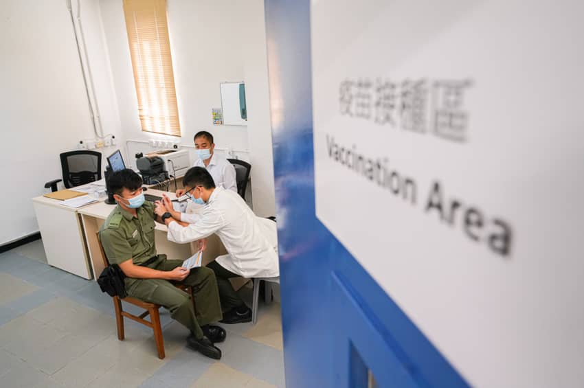 A correctional officer receives Covid-19 vaccine.
