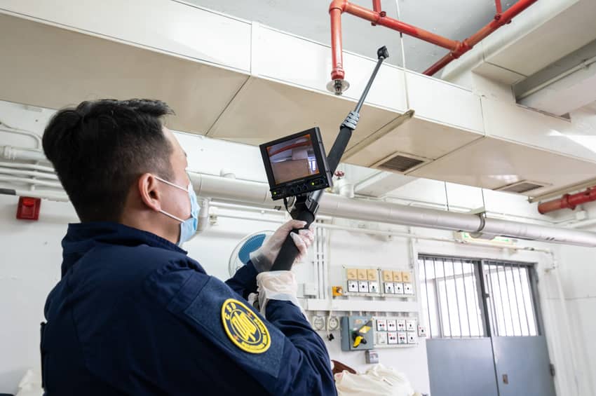 A security check is conducted in a correctional institution.