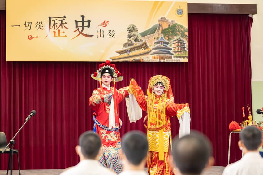 Young persons in custody attend a Cantonese opera class and practise tasselled spear techniques.