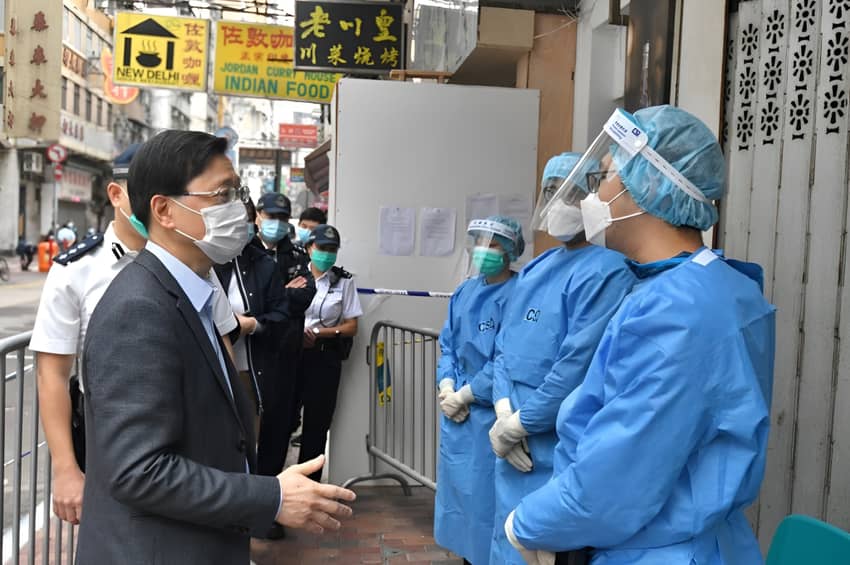 The then Secretary for Security, Mr John Lee, the then Secretary for the Civil Service, Mr Patrick Nip, and the then Deputy Commissioner of Correctional Services, Mr Wong Kwok-hing, visit the “restricted areas” in Jordan to give encouragement to colleagues.