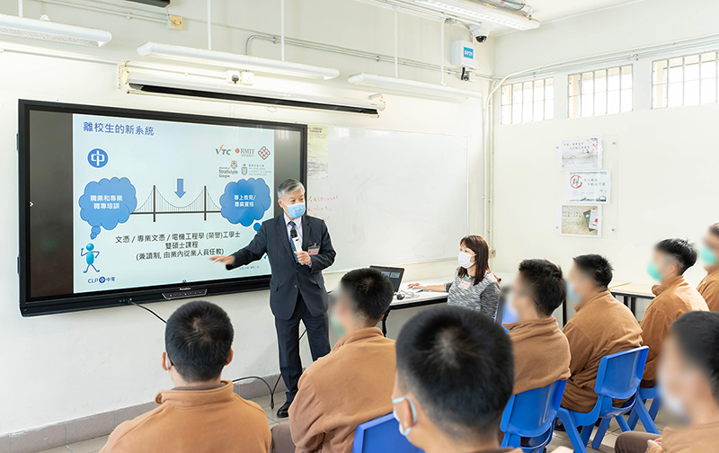 Persons in custody attend a life planning talk held by a major enterprise.