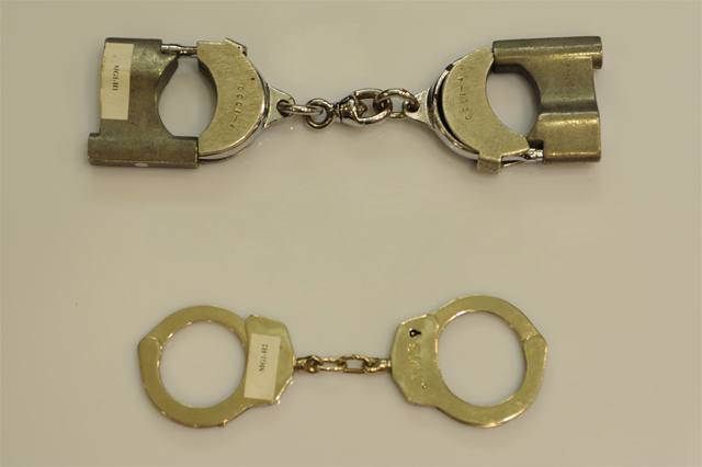 Escorting handcuffs in current use.