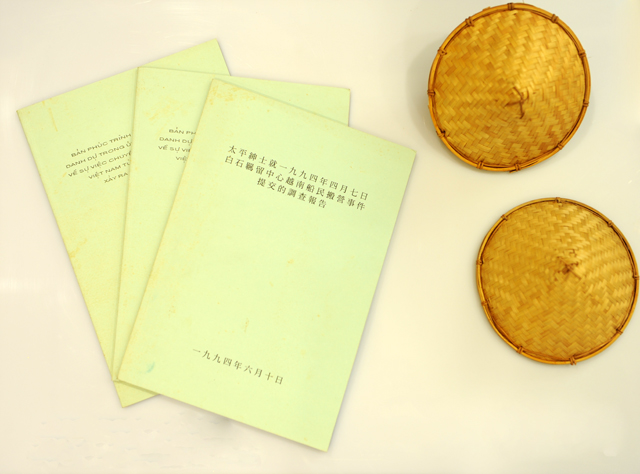 Home-made hats by Vietnamese boat people and the investigation report of Vietnamese boat people in Whitehead Detention Centre from Justice of the Peace on 7 April 1994.