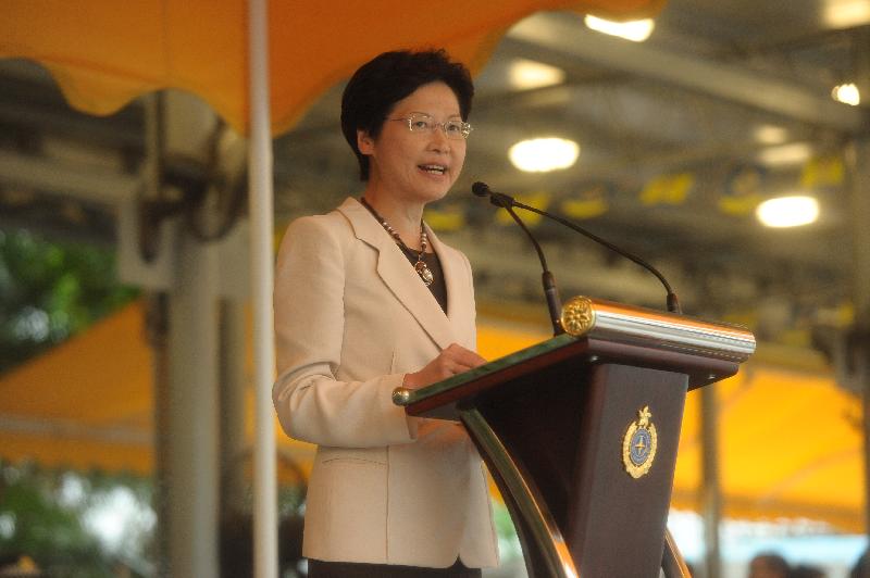 The Chief Secretary for Administration, Mrs Carrie Lam, addresses the Passing-out Parade of the Correctional Services Department (CSD) at its Staff Training Institute today (June 14). 