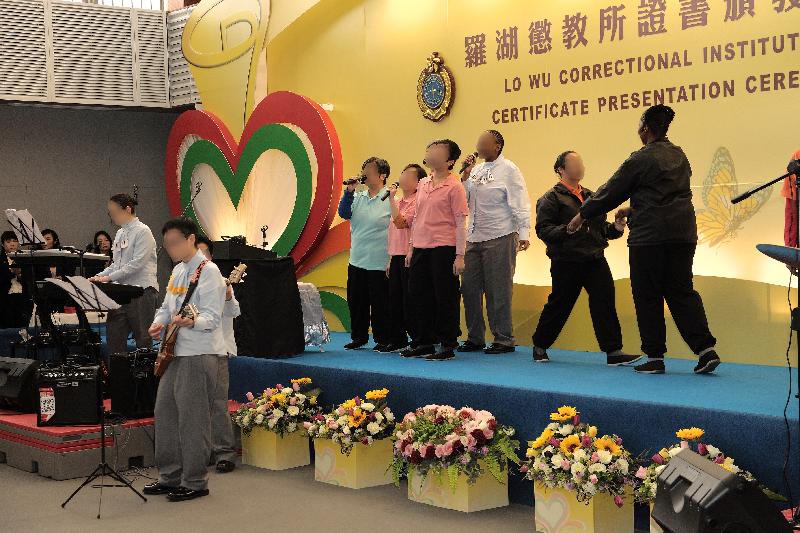 Members of Reborn, a band formed by persons in custody, sing "Spread Wings for Me", which was written by a rehabilitated person discharged from LWCI.