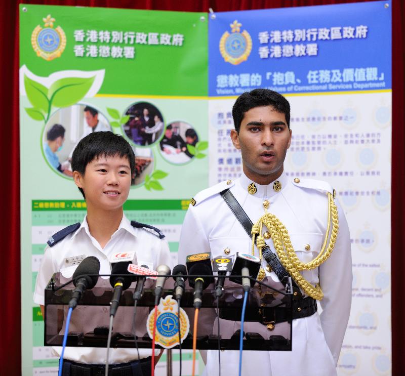 Two Assistant Officers II, Ms Lam Nga-yee and Mr Shahbaz Ali, meet the media.
