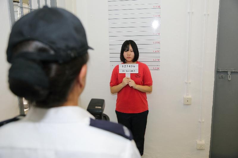 A student takes part in a mock reception procedure as part of "The Reflective Path".