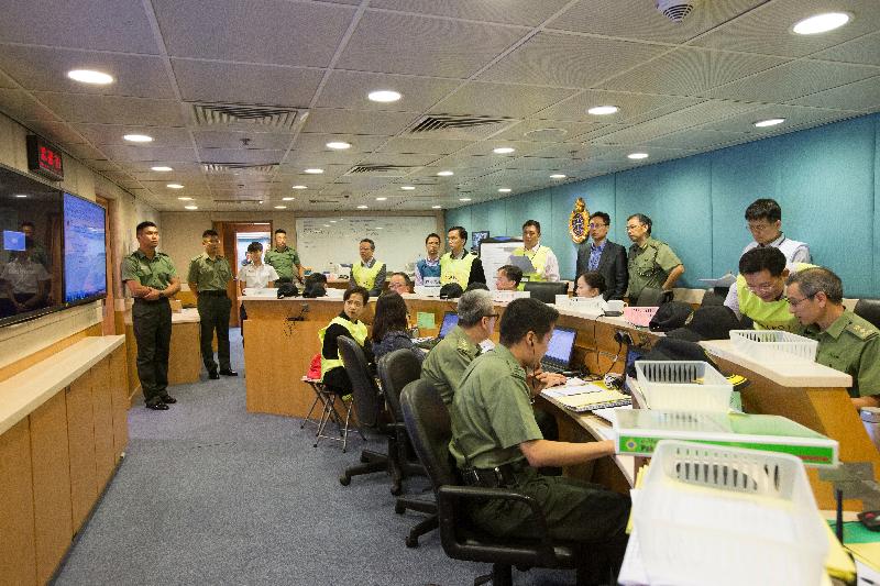 The Correctional Services Department conducted an emergency exercise today (October 14) to test the emergency response of its various units to a simulated mass indiscipline of persons in custody and hostage-taking situation inside Pak Sha Wan Correctional Institution. Photo shows the department's Central Control Centre in operation during the exercise.