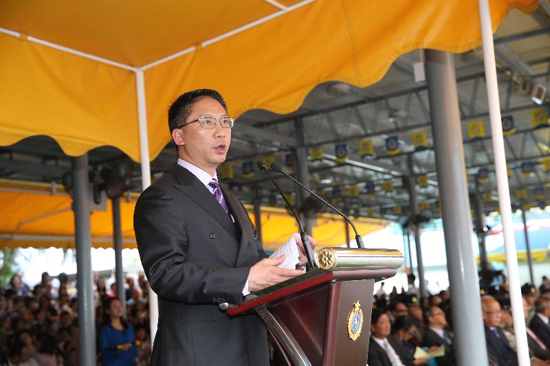 The Secretary for Justice, Mr Rimsky Yuen, SC, addresses a Correctional Services Department (CSD) passing-out parade at the Staff Training Institute of the CSD in Stanley today (October 23).