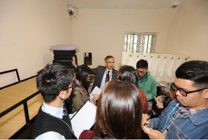 Assistant Commissioner (Operations), Mr Woo Ying-ming, introduces the dormitory of the Cape CollinsonCorrectional Institution during a media visit.