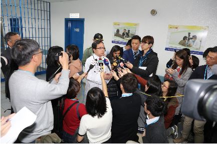 Senior Medical and Health Officer of Department of Health, Dr Kwong Ngar-ming, explains the daily operations of the centre hospital at Stanley Prison.