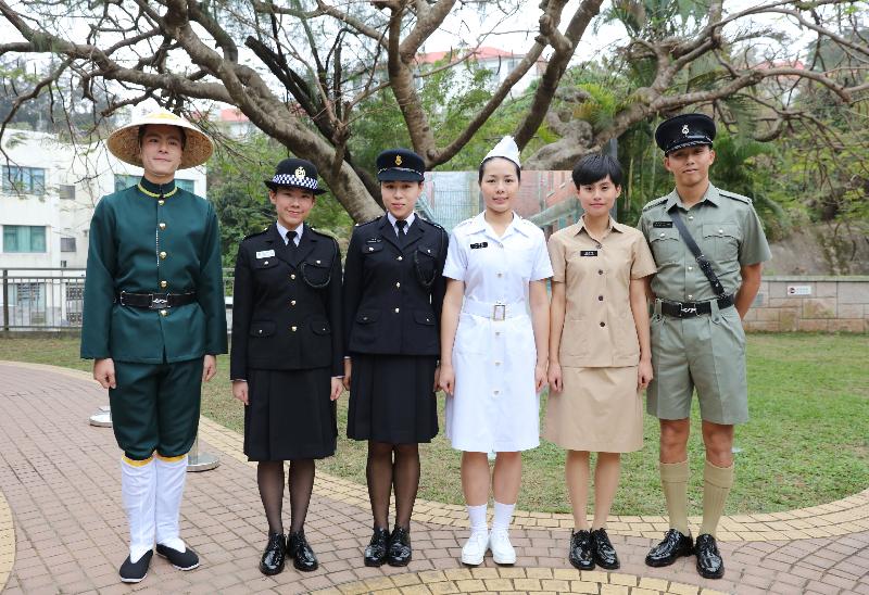 The Correctional Services Department (CSD) today (March 18) held an Open Day at the Staff Training Institute and the Hong Kong Correctional Services Museum in Stanley to tie in with the 20th anniversary of the establishment of the Hong Kong Special Administrative Region and the 35th anniversary of the Prisons Department's renaming as the Correctional Services Department. Photo shows CSD staff members dressing in old staff uniforms.