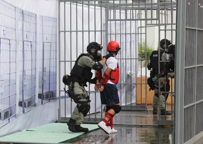 A tactical demonstration is staged at the Stanley Prison 80th Anniversary Open Day today (July 8).