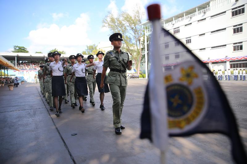 The Correctional Services Department held a passing-out parade at the Staff Training Institute in Stanley today (August 2). Photo shows the parade marching past the dais.