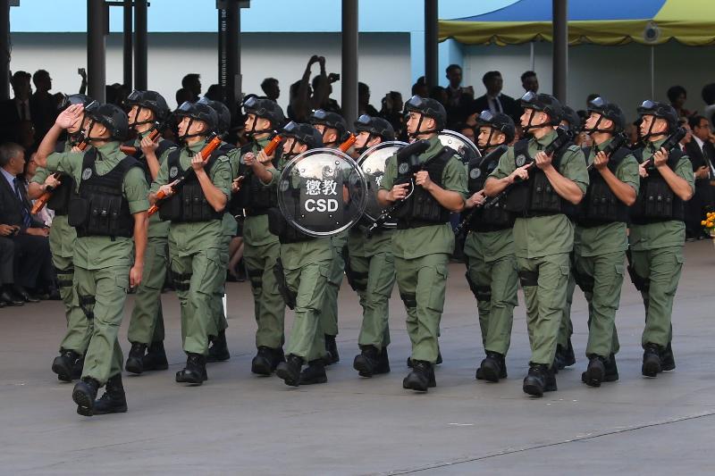 The Correctional Services Department held a Passing-out cum Commissioner's Farewell Parade at its Staff Training Institute in Stanley today (November 23).