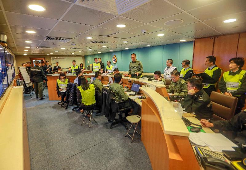 The Correctional Services Department carried out an exercise today (December 12) to test the emergency response of its various units at Hei Ling Chau Addiction Treatment Centre. Photo shows the department's Central Control Centre in operation during the exercise.