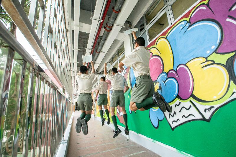 The results of the 2019 Hong Kong Diploma of Secondary Education Examination were released today (July 10). Young persons in custody obtained satisfactory results in the examination this year. Photo shows young persons in custody jumping for joy.