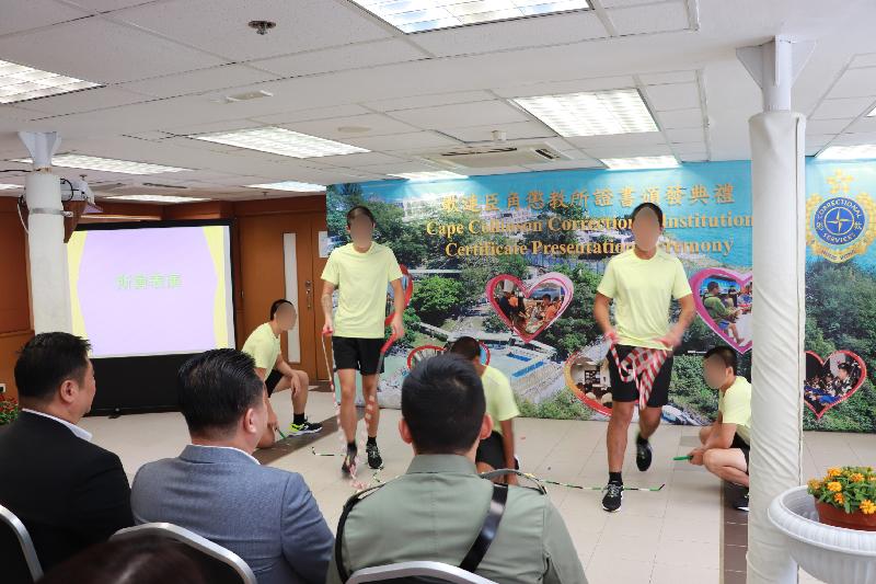 Twenty-one young persons in custody at Cape Collinson Correctional Institution were presented with certificates at a ceremony in recognition of their study efforts and achievements today (October 23). Photo shows young persons in custody performing rope skipping at the ceremony.