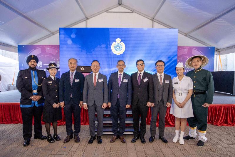 To celebrate the 100th anniversary of the establishment of the Correctional Services Department (CSD), a “Kick-off Ceremony of Celebration Events cum Carnival for 100th Anniversary of CSD” was held at Tai Kwun, Central today (January 12). Photo shows the Director of Fire Services, Mr Li Kin-yat (third left); the Director of Immigration, Mr Erick Tsang (fourth left); the Commissioner of Correctional Services, Mr Woo Ying-ming (centre); the Commissioner of Police, Mr Tang Ping-keung (fourth right); and the Commissioner of Customs and Excise, Mr Hermes Tang Yi-hoi (third right), posing with correctional officers.