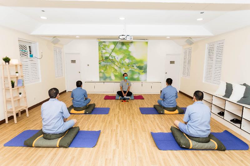 The Correctional Services Department officially launched a new initiative called "Mindfulness Place", the first mindfulness-based psychological treatment programme for male persons in custody, at Hei Ling Chau Drug Addiction Treatment Centre today (July 3). Photo shows male persons in custody practicing mindfulness exercises.