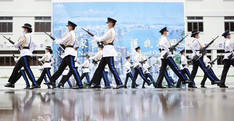 The Correctional Services Department is fully supporting National Security Education Day today (April 15), and held an open day at its Staff Training Institute. Photo shows Chinese-style foot drill demonstrations.