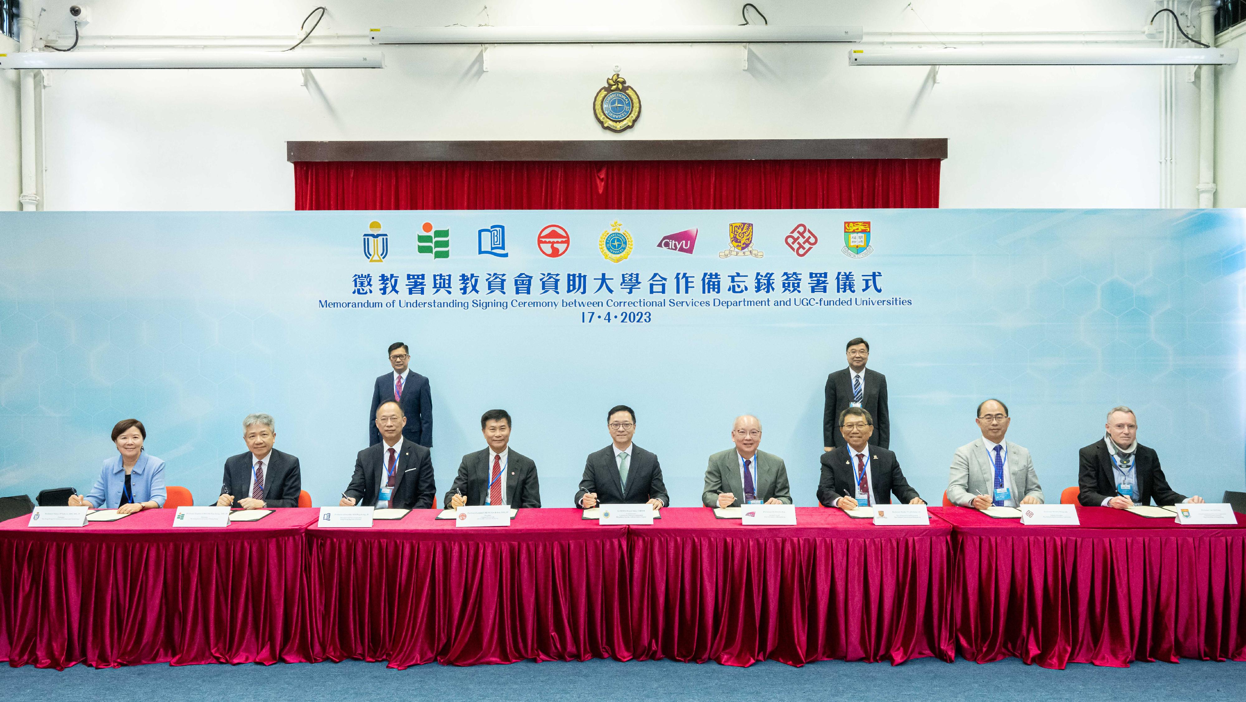 The Correctional Services Department and eight University Grants Committee (UGC)-funded universities signed a Memorandum of Understanding (MoU) today (April 17) to facilitate the continuous education of persons in custody who were students of the universities before imprisonment and wish to continue their studies. The MoU was signed by the Commissioner of Correctional Services, Mr Wong Kwok-hing (front row, centre), and the Presidents/representatives of the eight UGC-funded universities, and witnessed by the Secretary for Security, Mr Tang Ping-keung (back row, left), and the Chairman of the Research Grants Council, Professor Wong Yuk-shan (back row, right), on behalf of the UGC.