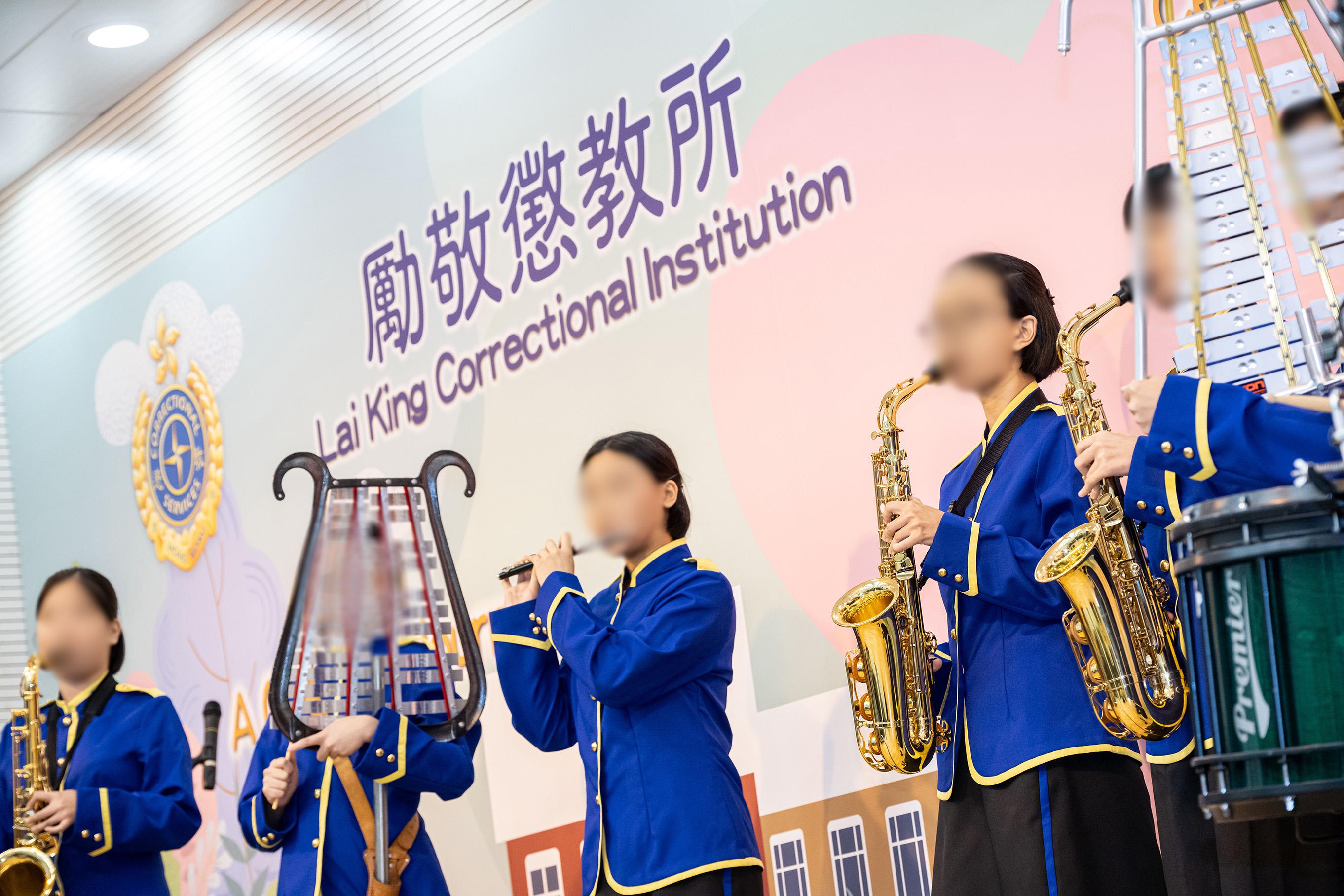 Young persons in custody at Lai King Correctional Institution of the Correctional Services Department were presented with certificates at a ceremony today (September 20) in recognition of their efforts and achievements in studies and vocational examinations. Photo shows young persons in custody members of the marching band presenting a music performance at the ceremony.