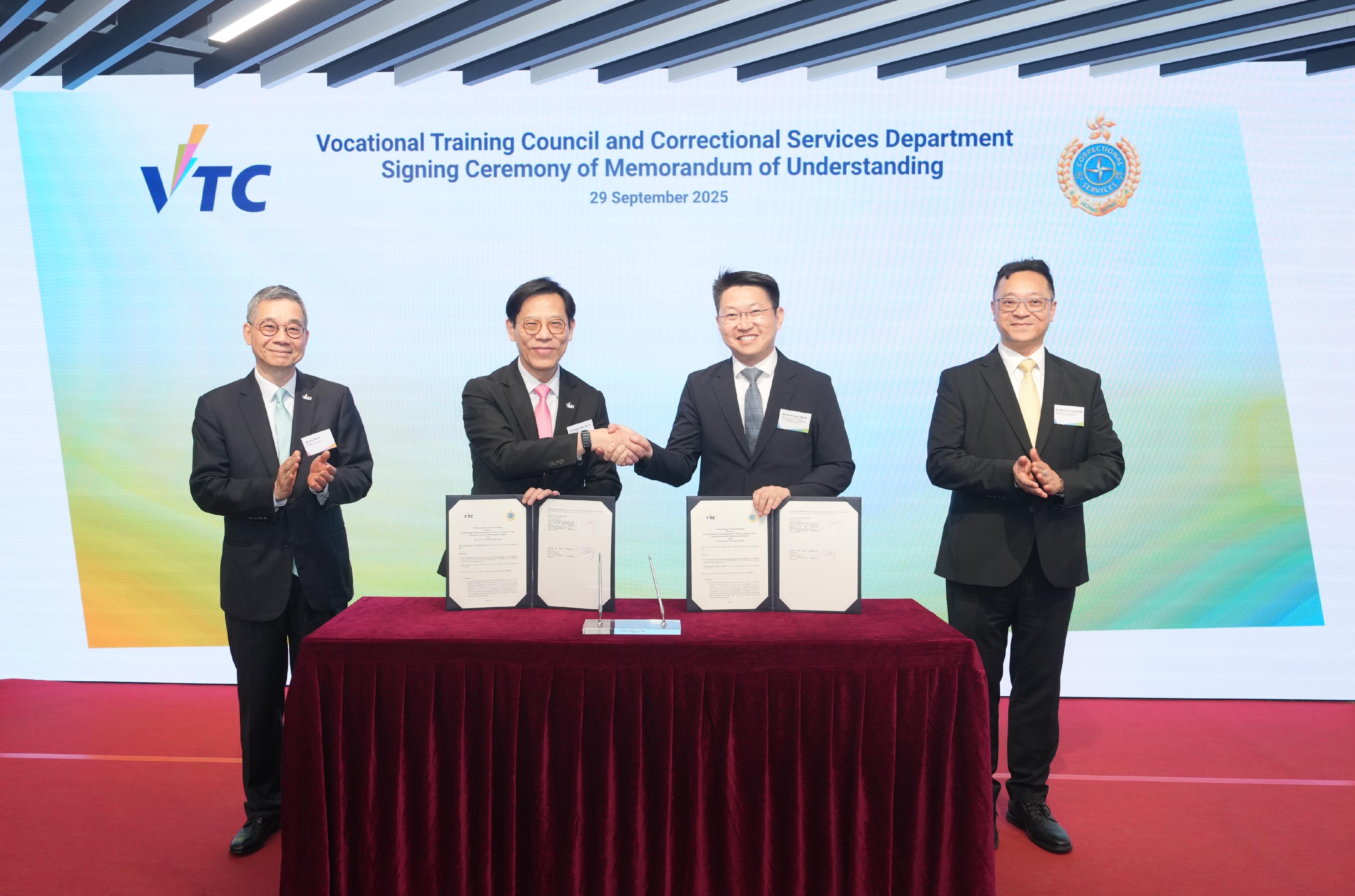 The Correctional Services Department and the Vocational Training Council (VTC) signed a Memorandum of Understanding (MOU) today (September 29) to deepen collaboration, which will inject new impetus into the sustainable development of correctional services and the promotion of talent training. Witnessed by the Commissioner of Correctional Services, Mr Wong Kwok-hing (first right), and the Chairman of the VTC, Mr Tony Tai (first left), the MOU was signed by the Deputy Commissioner of Correctional Services (Rehabilitation and Management), Mr Ng Chiu-kok (second right), and the Executive Director of the VTC, Mr Donald Tong (second left).