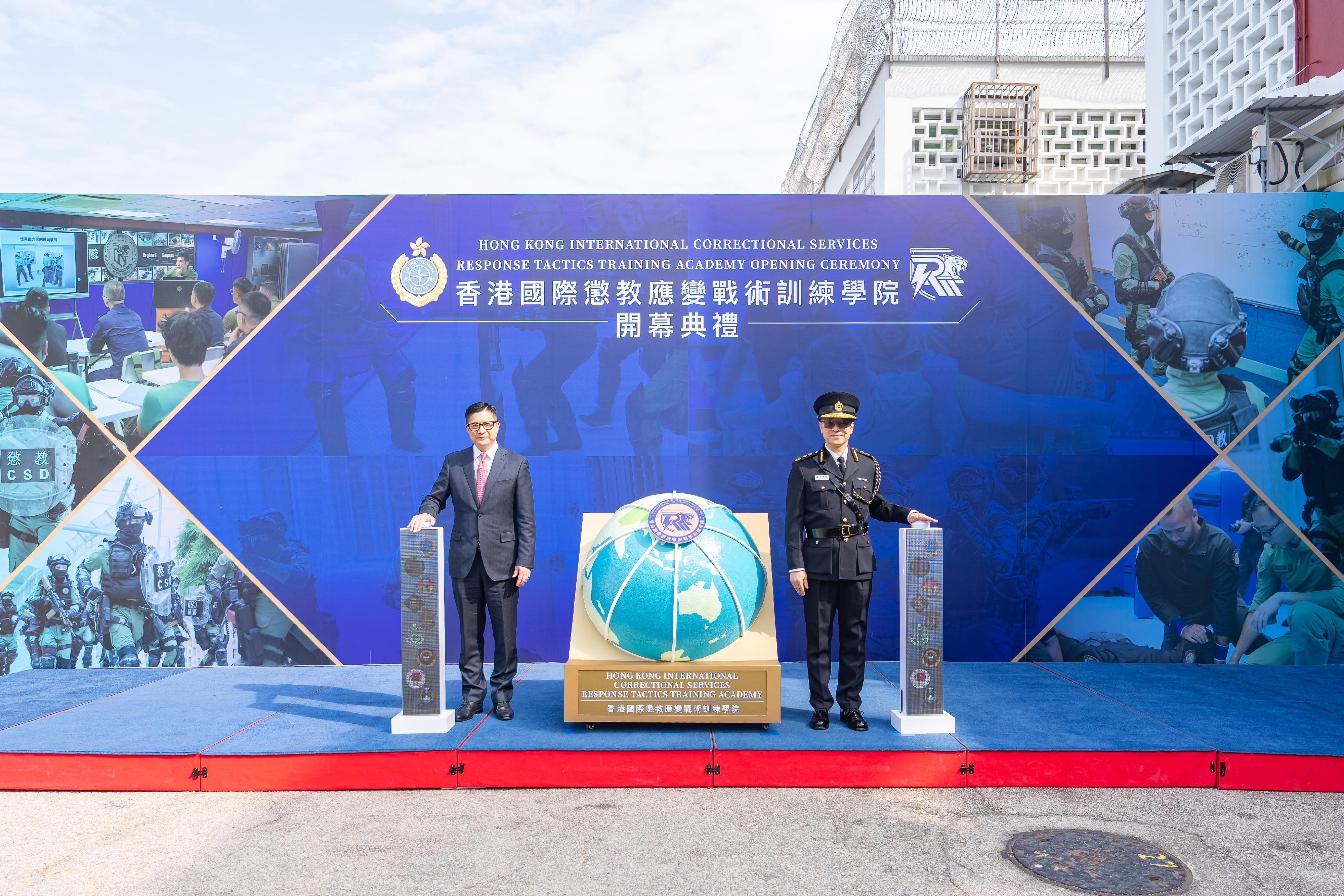 The Correctional Services Department today (January 27) held the opening ceremony of the Hong Kong International Correctional Services Response Tactics Training Academy. Photo shows the Secretary for Security, Mr Tang Ping-keung (left), and the Commissioner of Correctional Services, Mr Wong Kwok-hing (right), officiating at the opening ceremony.