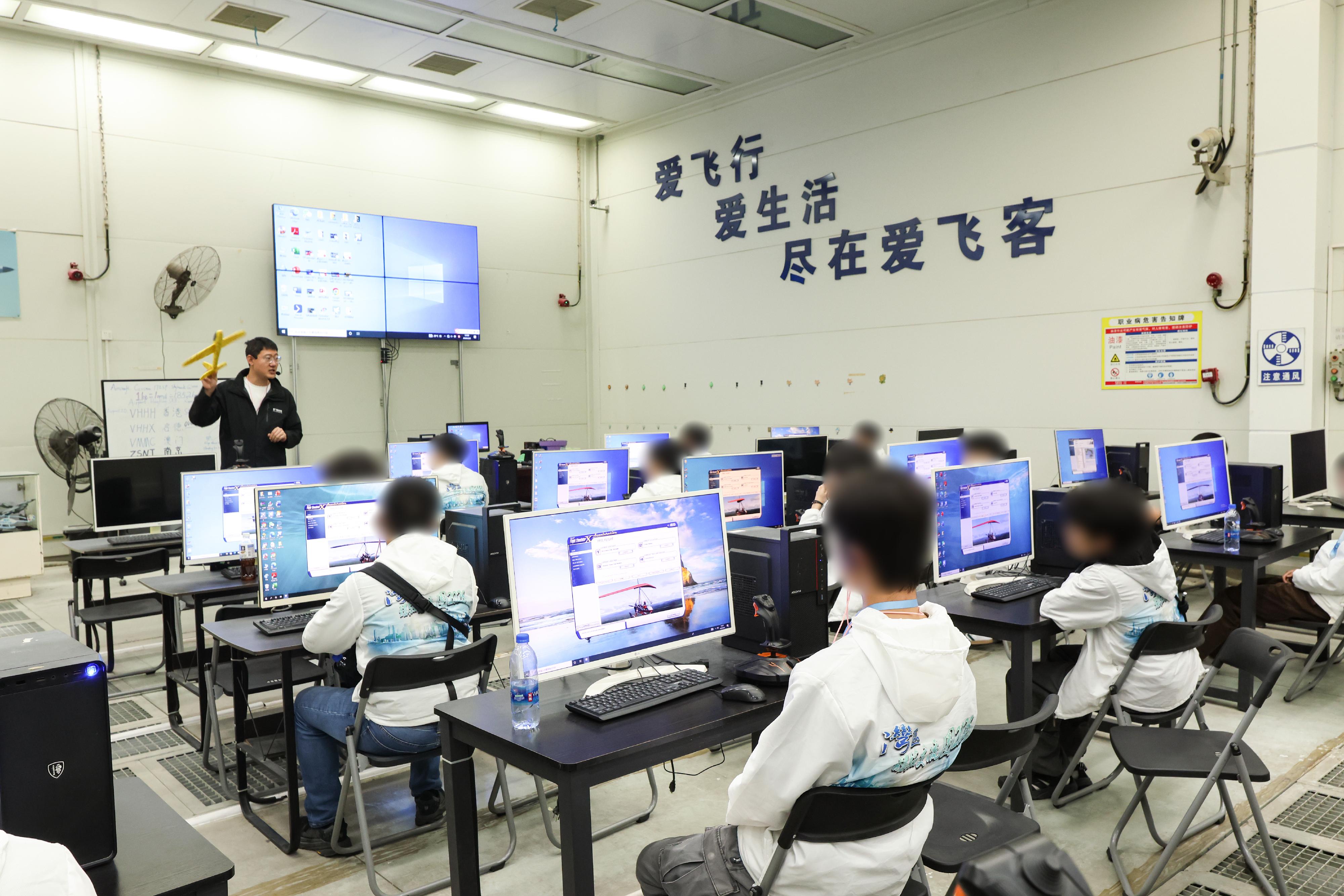 To further cultivate national consciousness and positive values in young rehabilitated persons, correctional officers led youths who have completed their sentences and are under statutory supervision to participate in the Greater Bay Area Experience Exchange Tour 2026, visiting Foshan and Zhuhai in the Guangdong-Hong Kong-Macao Greater Bay Area for three days and two nights of exchanges, so that they could learn about the country&rsquo;s history and culture as well as its developments in various fields. Photo shows young rehabilitated persons visiting a general aircraft company in Zhuhai on February 8 to gain an understanding of national aircraft research and development, aircraft manufacturing and operational services.