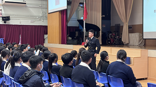 A graduate returns to her alma mater in uniform and hosts an education talk