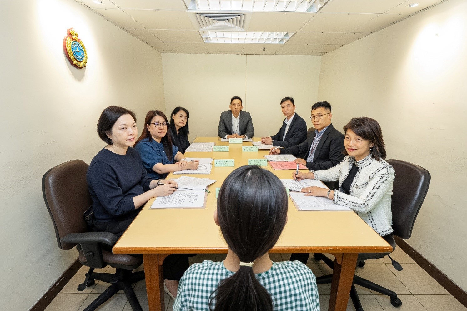 Young Offender Assessment Panel interviewing an inmate